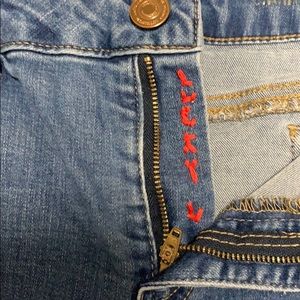 Custom made embroidered “Lucky U” denim shorts